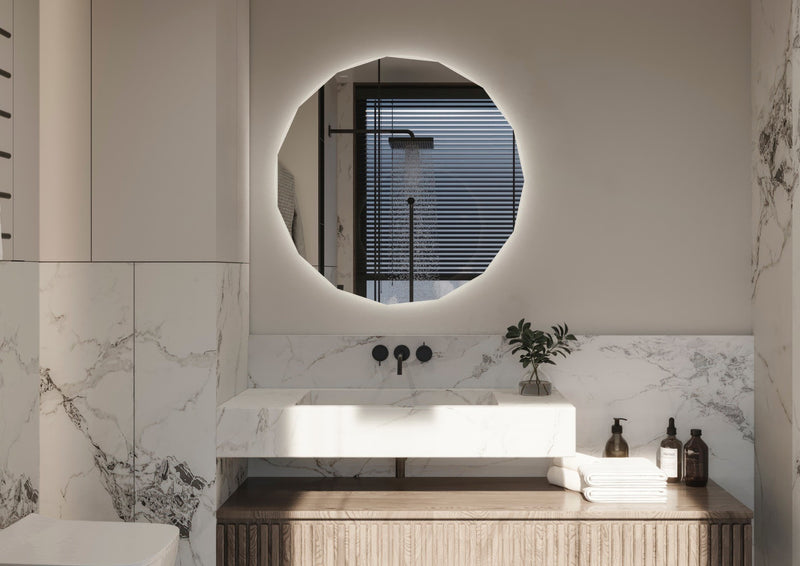 Espejo de baño con luz LED redondo a medida con arenado poligonal y luz frontal y ambiental · Modelo CIRCON