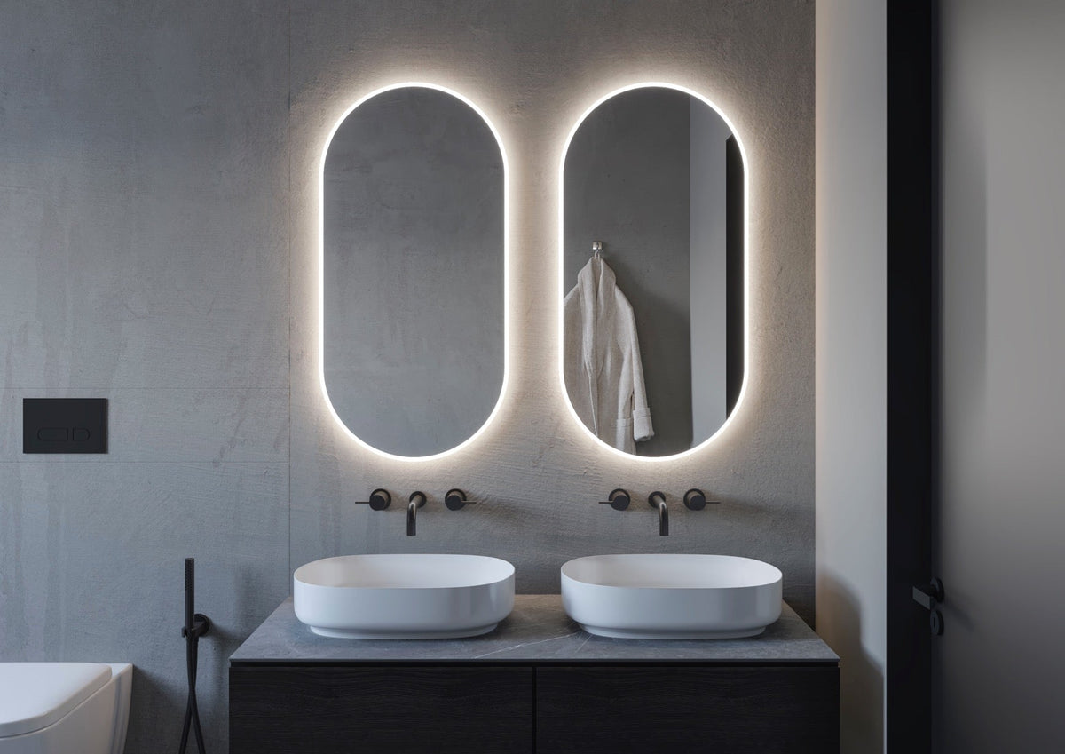 Espejo de baño con luz LED ovalado a medida retroiluminado y luz frontal · Modelo DENOR [config]
