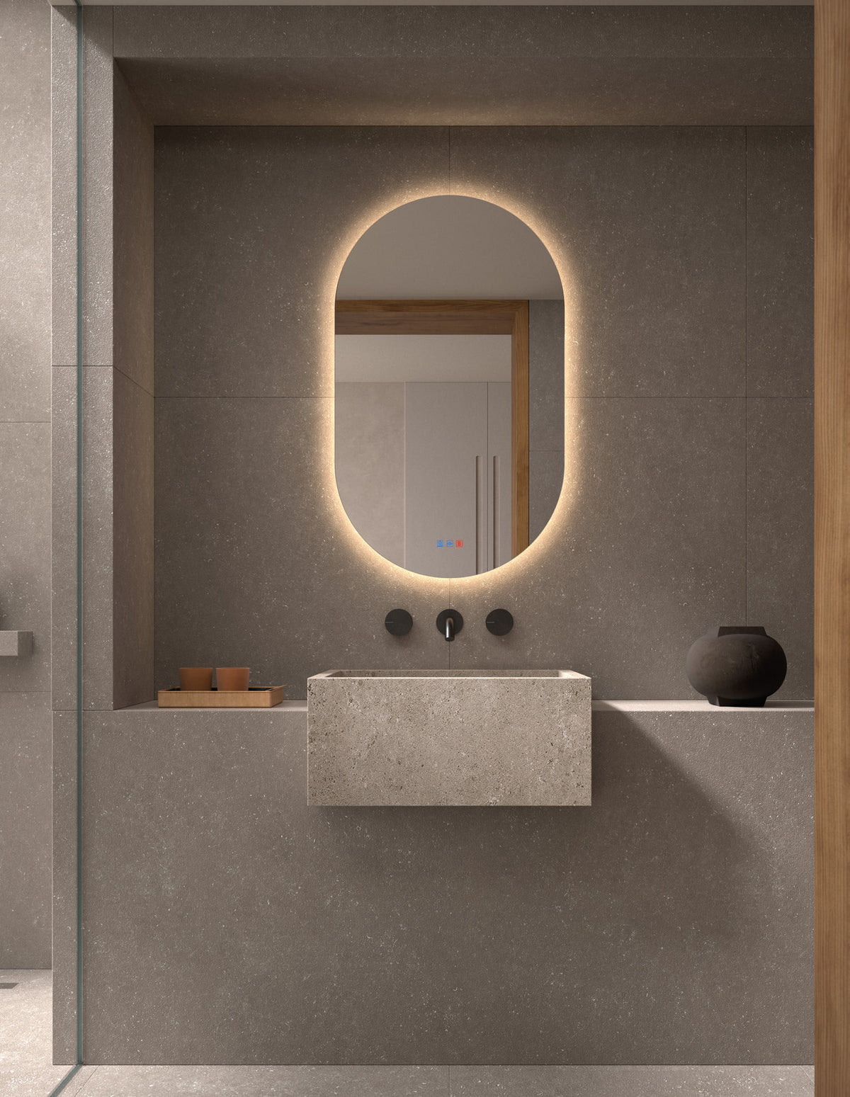 Baño con el espejo ovalado Segovia con luz LED y halo de luz continua